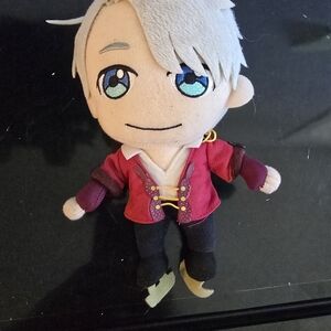 Plush Doll with Red Jacket and Blue Eyes